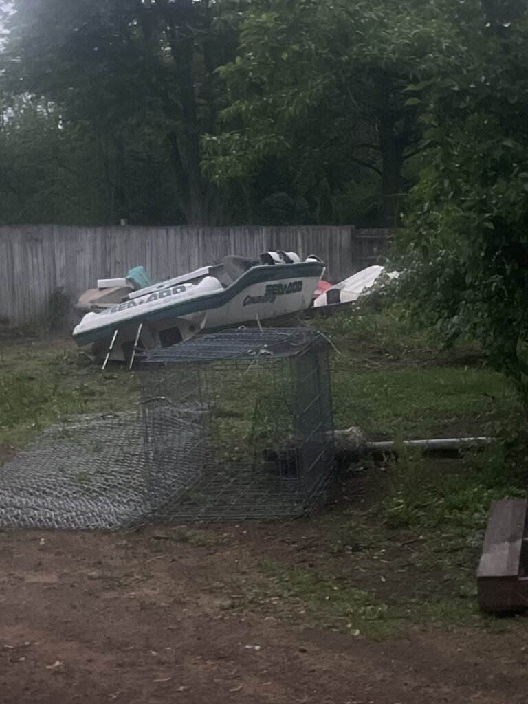 Damaged Sea-Doo personal watercraft awaiting removal in Sylvania, Ohio